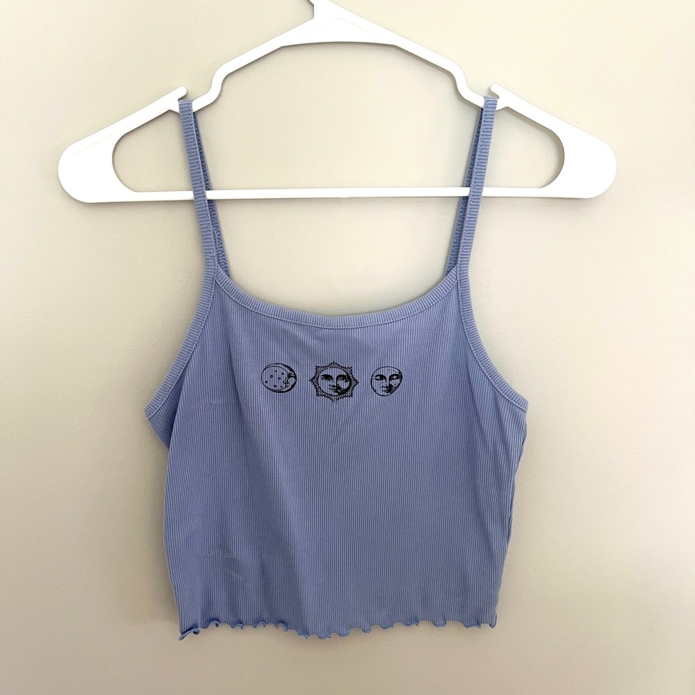 Light blue, cropped tank top. Has only been worn once!